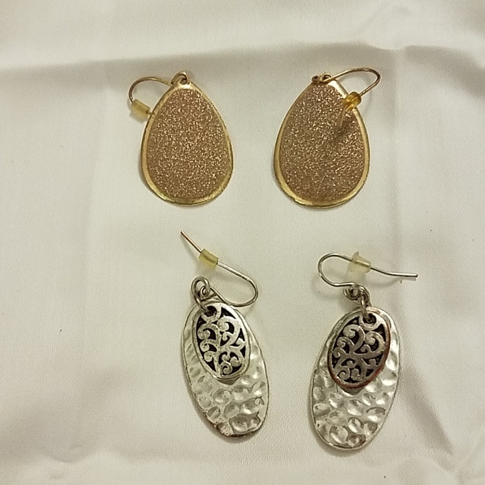 Two pairs of earrings gold and silver